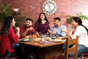 Indian friends eating food in restaurant - Coffee Shop Celebration Friendship Togetherness concept