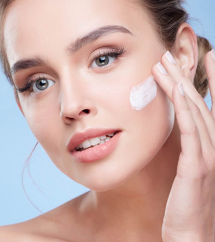 woman applying moisturiser. how to stop acne 3