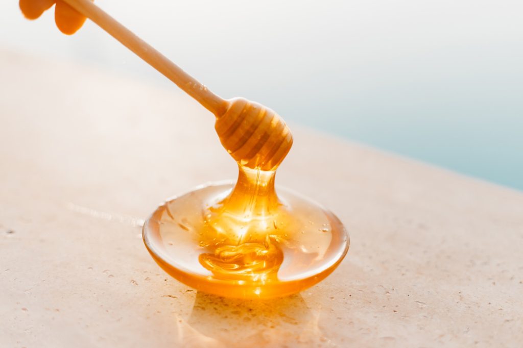 honey in a bowl. cough home remedies 5